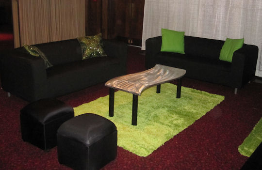Sofas and poofs with S coffee tables
